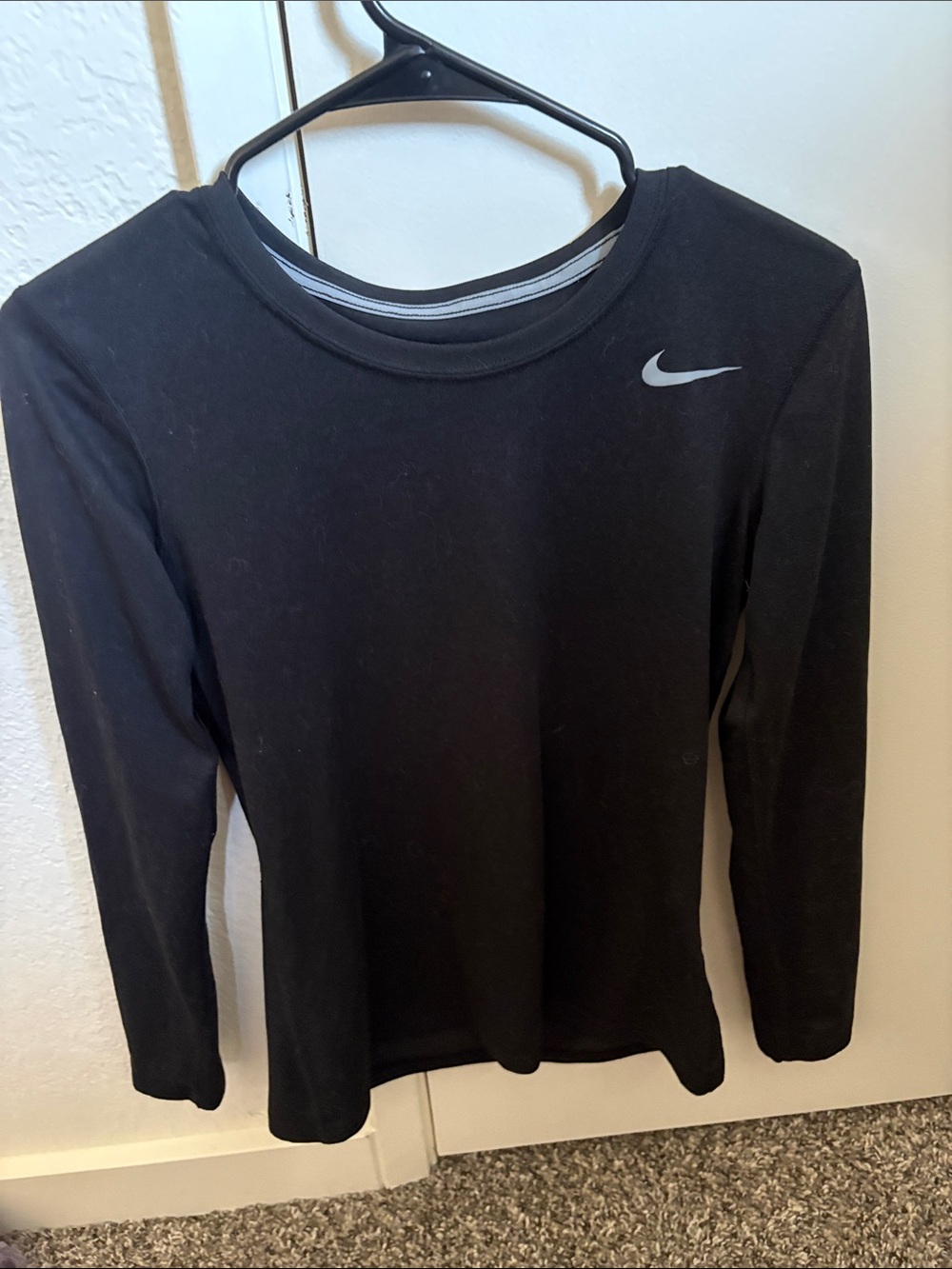 Nike Black Long Sleeve Top with Silver Swoosh Accent
